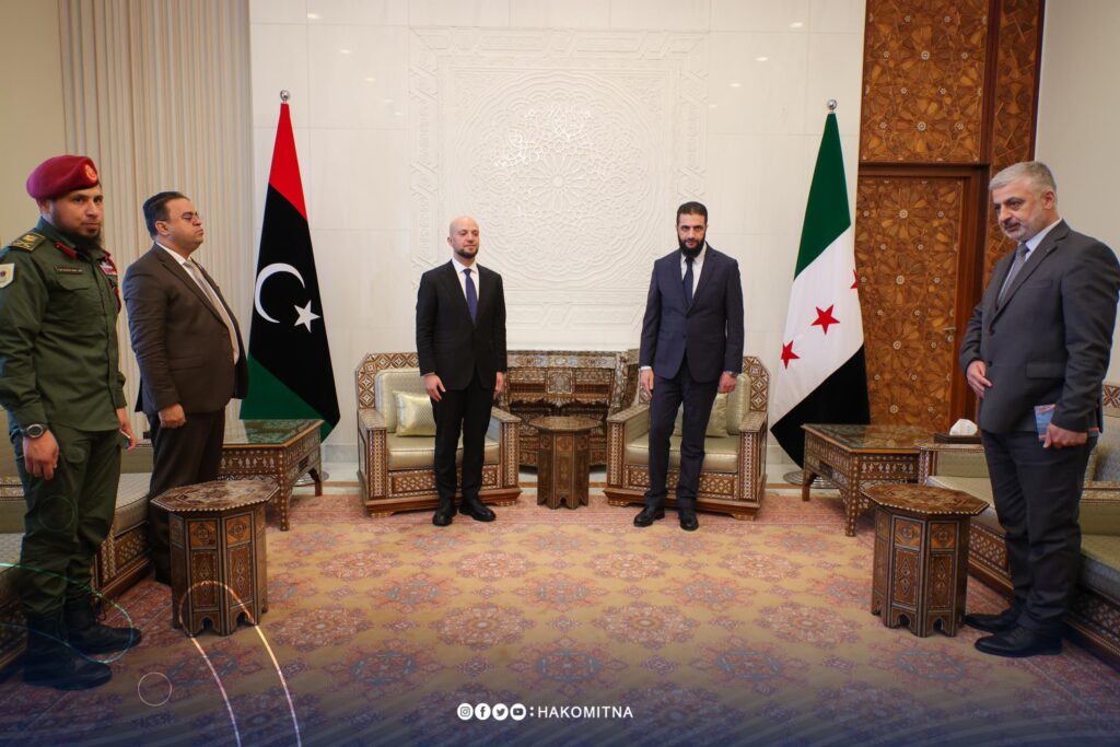 Libyan Walid Ellafi, L, and Syrian leader Ahmed al-Sharaa meet in Damascus, 28 December 2024. (Hakomitna photo)