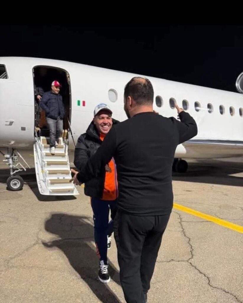 Brigadier General Osama Najim is getting off a plane upon arriving in Mitiga International Airport, 21 January 2025. (Social media photo)